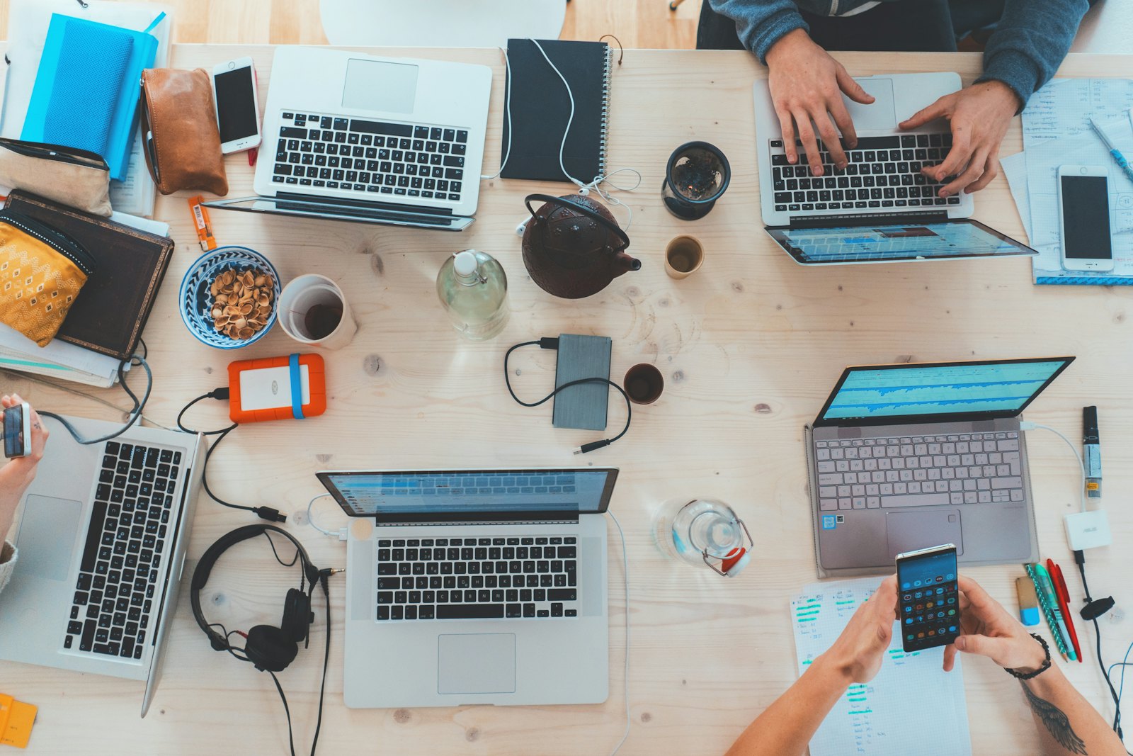 Laptops around a table